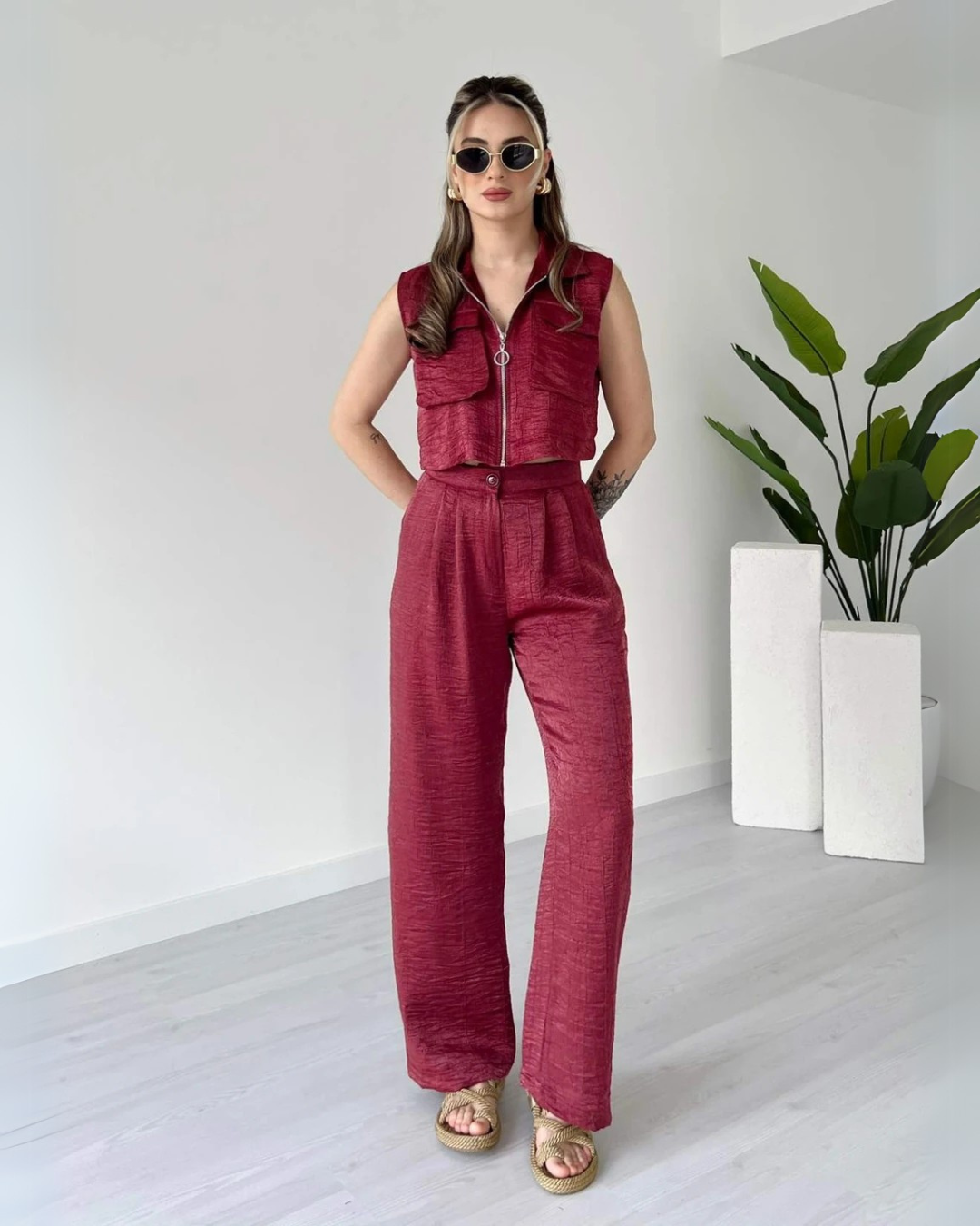 Close-up of sleeveless maroon crop top with pocket detail – trendy co-ord look